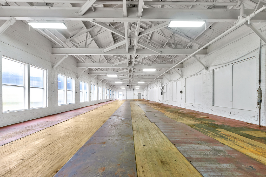 Interior shot of the SALAD CALENDAR events space, showing windows along the north side of the space